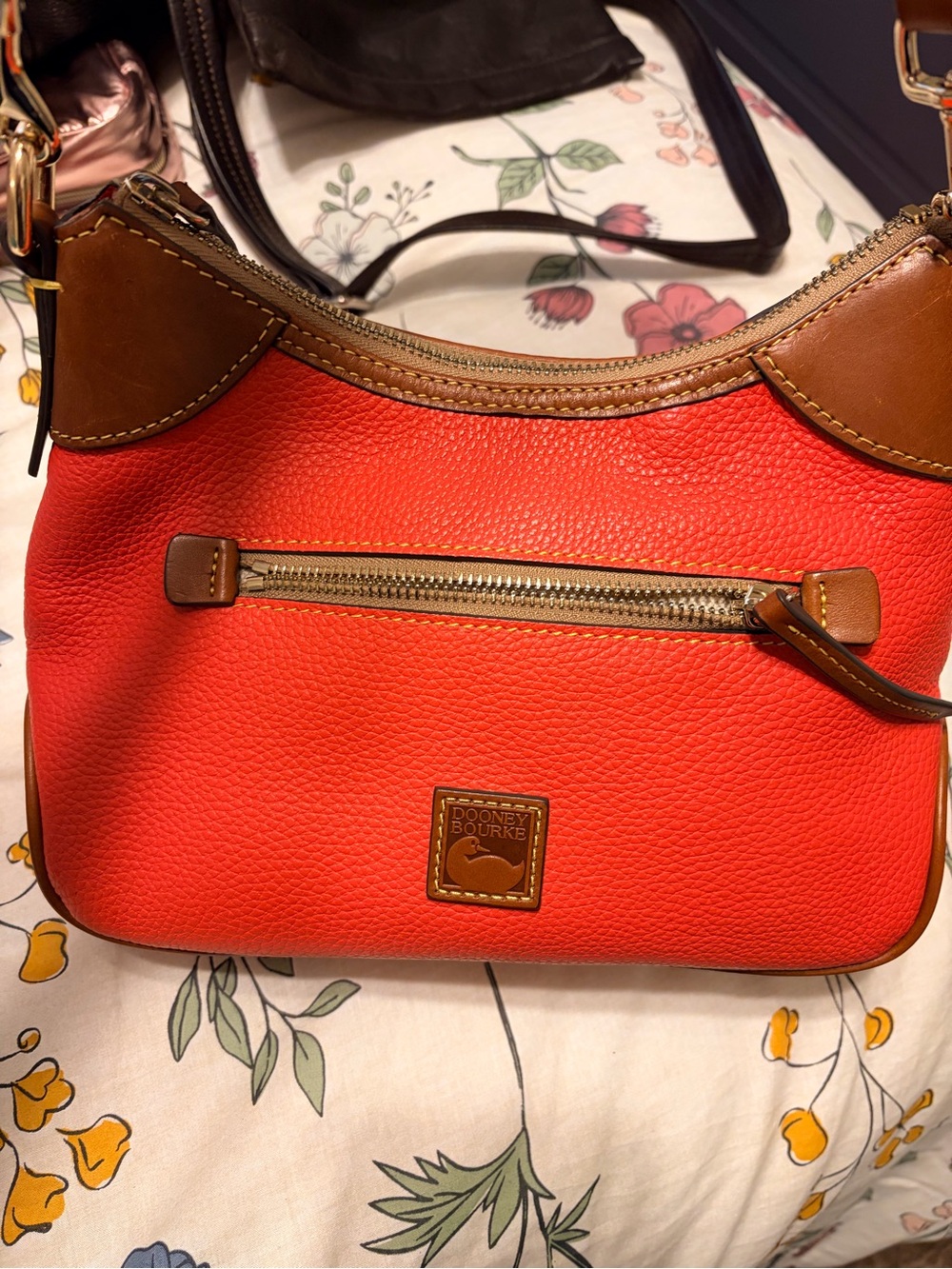 Dooney & Bourke Coral-Orange Pebbled Leather Crossbody with Brown Trim